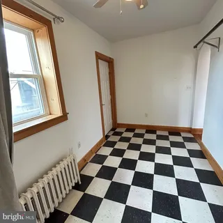 a black and white checkered floor with a black white checkered floor