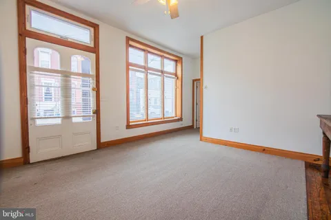 an empty room with windows