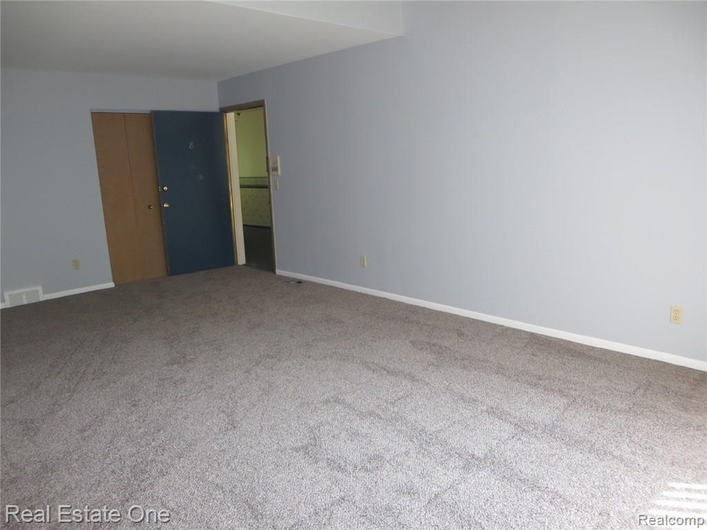 946 North Adams Road Birmingham, MI 48009 - Photo 6 of 26 Living Room to Front Door
