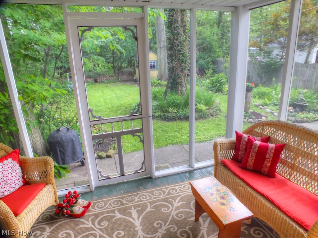 1767 Oakmount Road South Euclid, OH 44121 - Photo 17 of 25 And now, the outside tour! You will fall in love with this wonderful porch and the serenity and beauty beyond! The perfect place to be if you've had a bad day...you will definitely smile again!