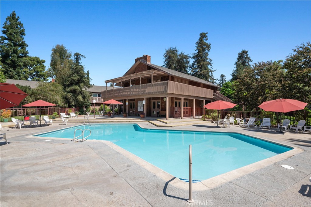 1044 Cabrillo Park Drive, Unit B Santa Ana, CA 92701 - Photo 34 of 49 a view of a house with swimming pool and sitting area