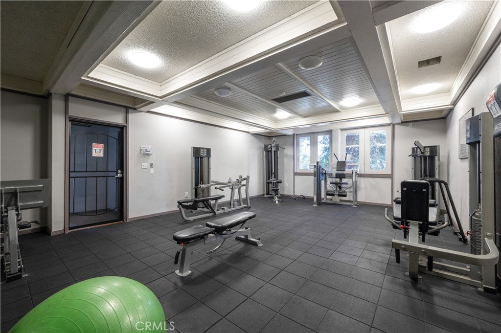 1044 Cabrillo Park Drive, Unit B Santa Ana, CA 92701 - Photo 37 of 49 a view of a room with gym equipment