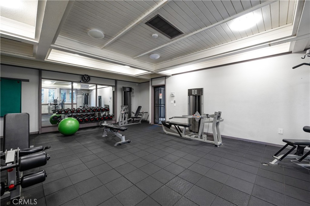 1044 Cabrillo Park Drive, Unit B Santa Ana, CA 92701 - Photo 38 of 49 a view of a room with gym equipment
