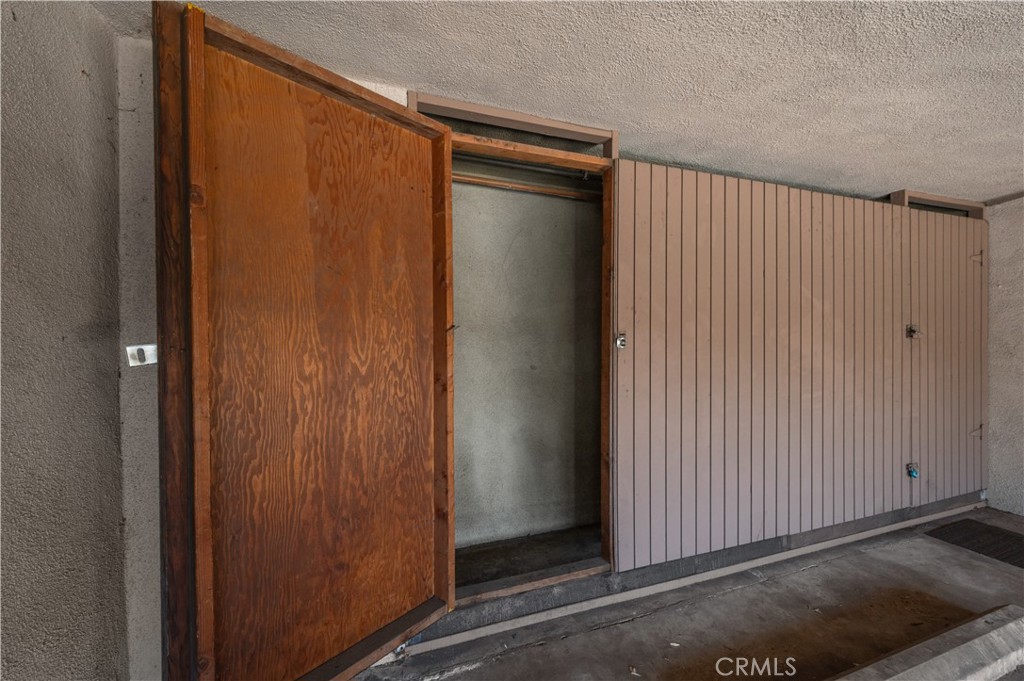 1044 Cabrillo Park Drive, Unit B Santa Ana, CA 92701 - Photo 43 of 49 an empty room with a wooden door