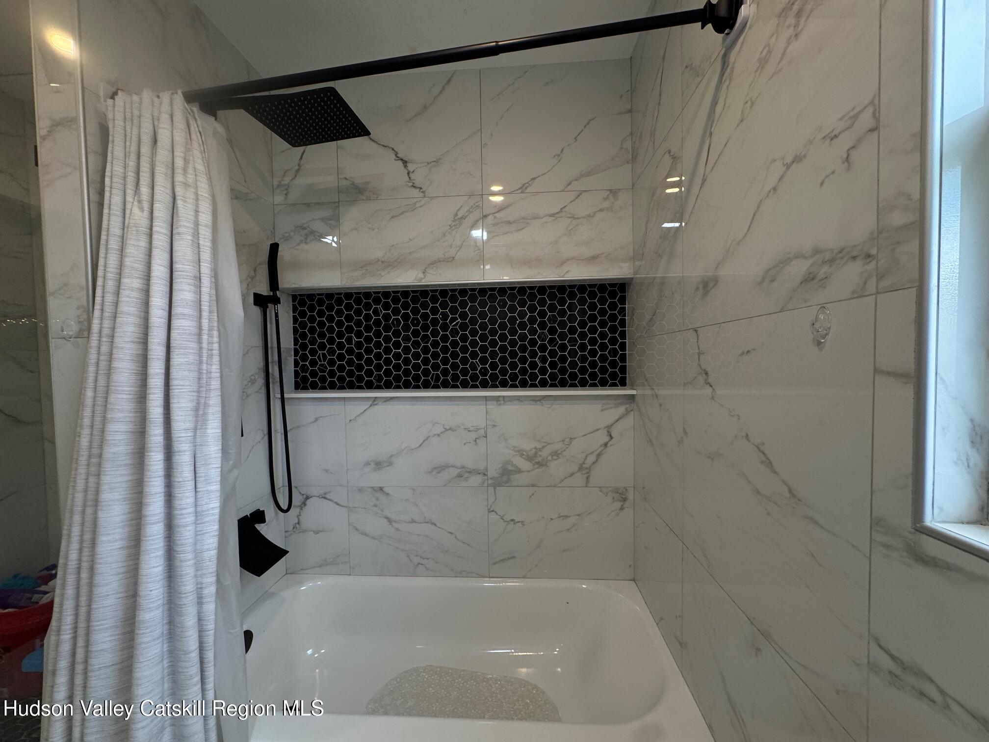 2 Spaulding Lane Saugerties, NY 12477 - Photo 20 of 24 a bathroom with a shower and a bathtub