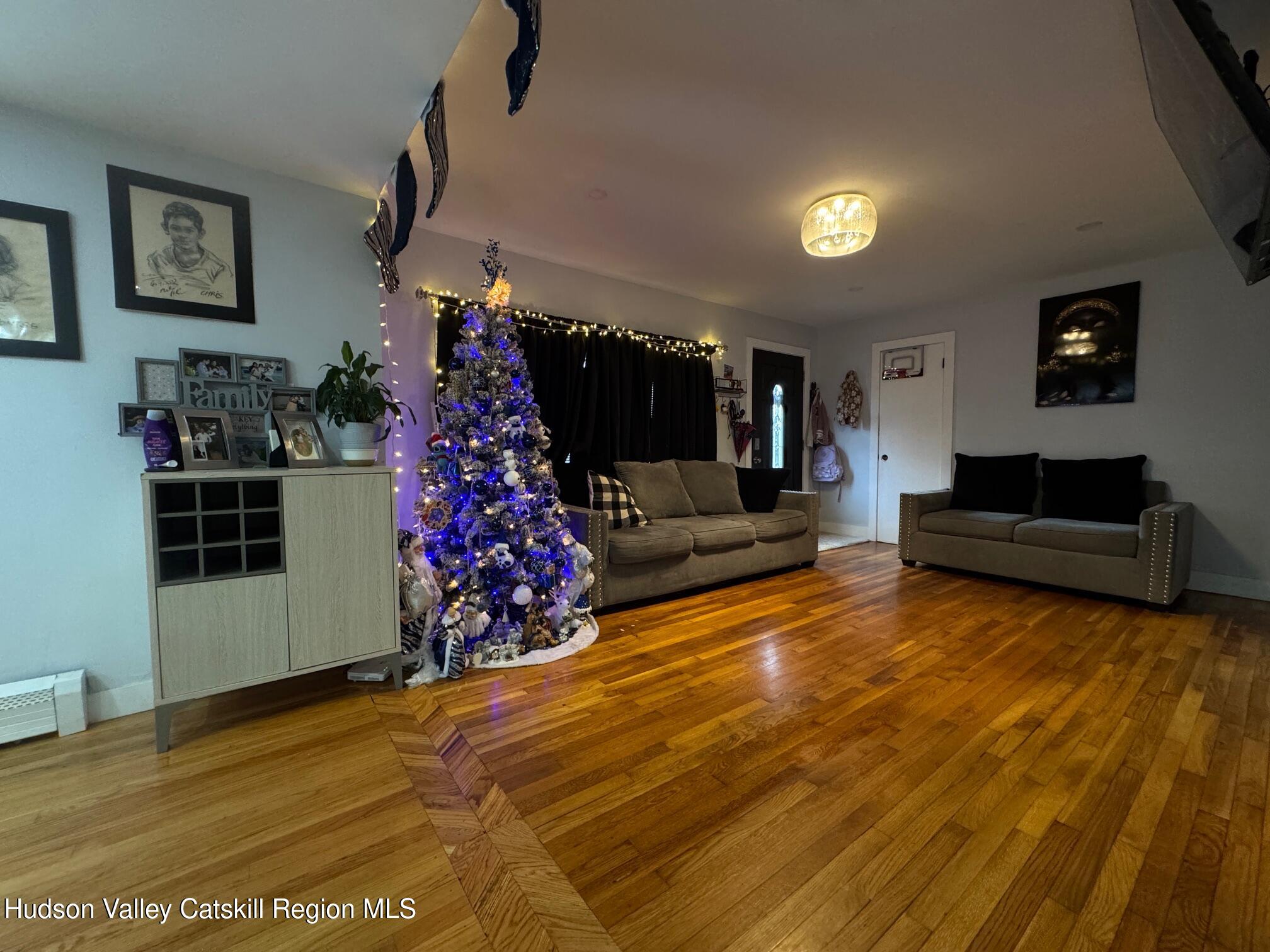 2 Spaulding Lane Saugerties, NY 12477 - Photo 23 of 24 a living room with furniture and a fireplace