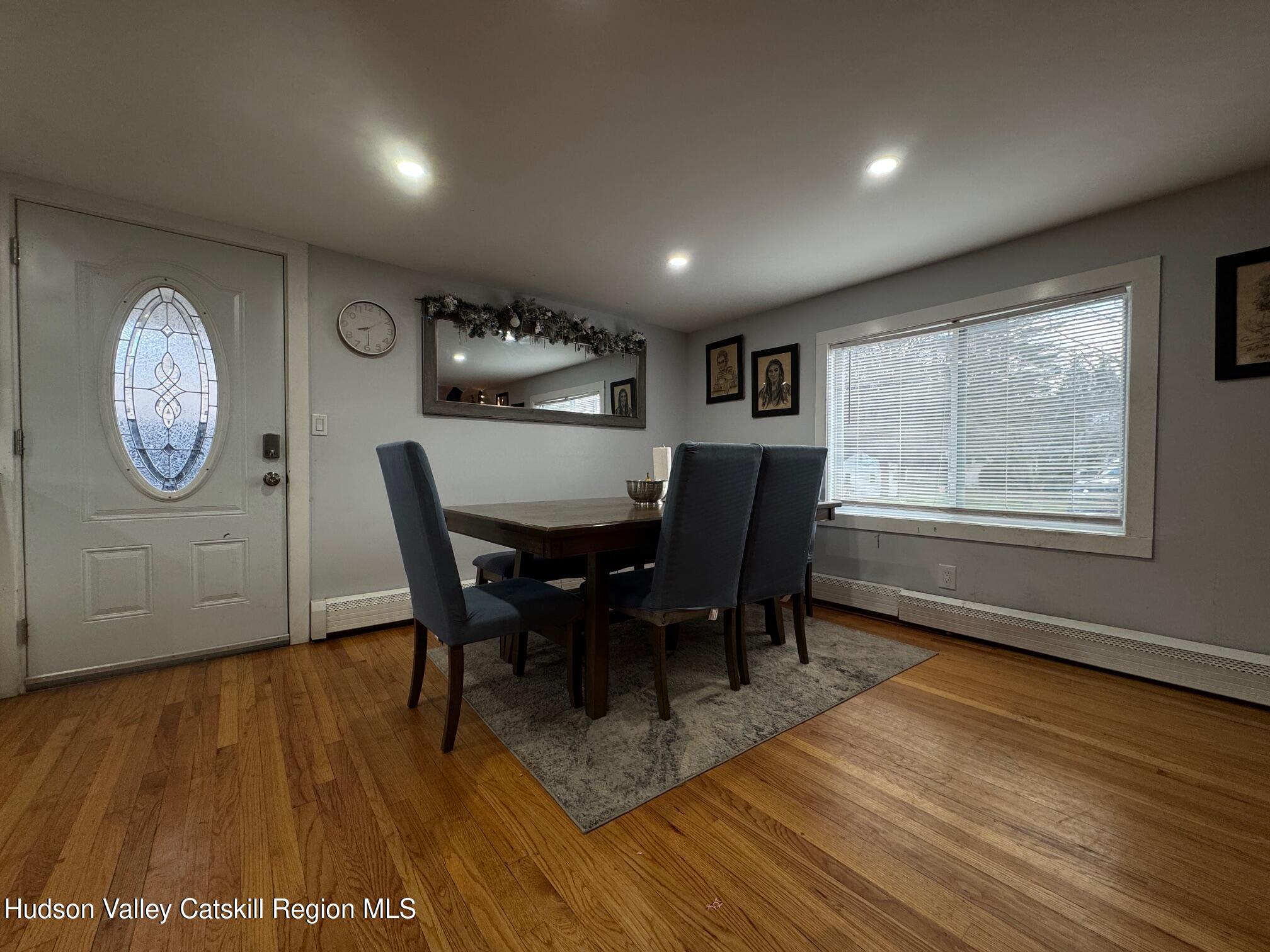 2 Spaulding Lane Saugerties, NY 12477 - Photo 4 of 24 a view of a dining room with furniture window and wooden floor