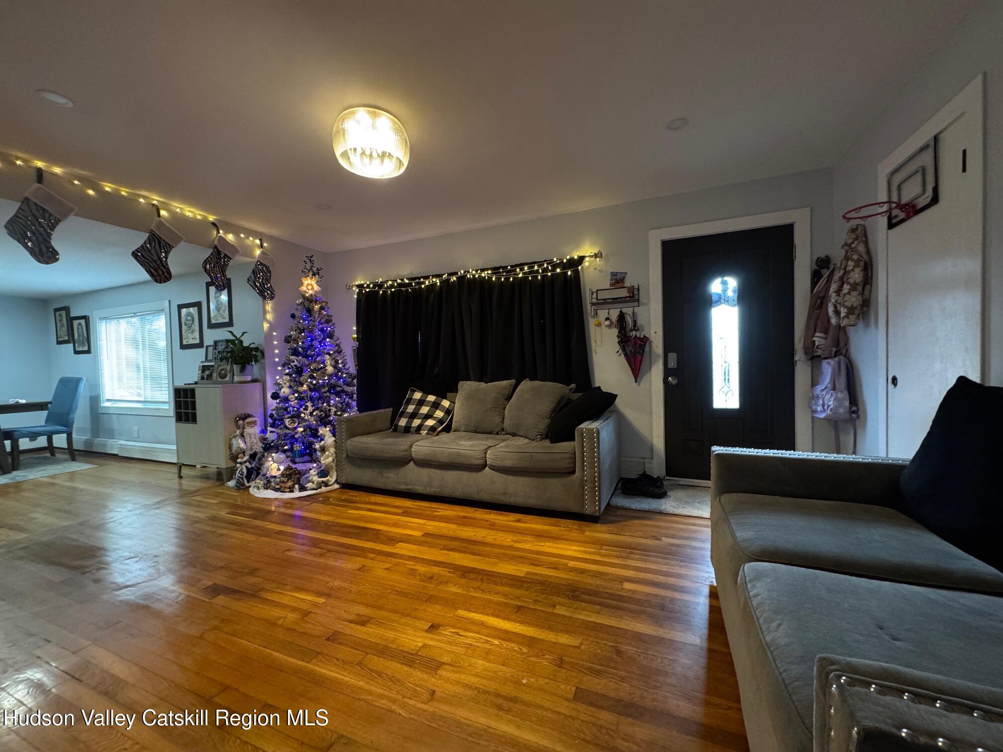 2 Spaulding Lane Saugerties, NY 12477 - Photo 6 of 24 a living room with furniture and a wooden floor