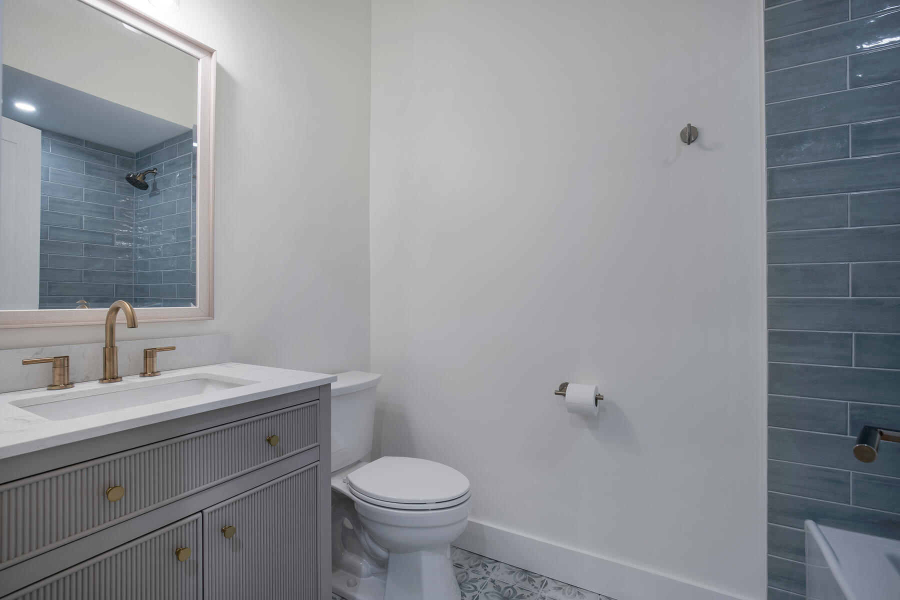 42 Sandy Valley Road Marstons Mills, MA 02648 - Photo 17 of 43 a bathroom with a toilet a sink and mirror