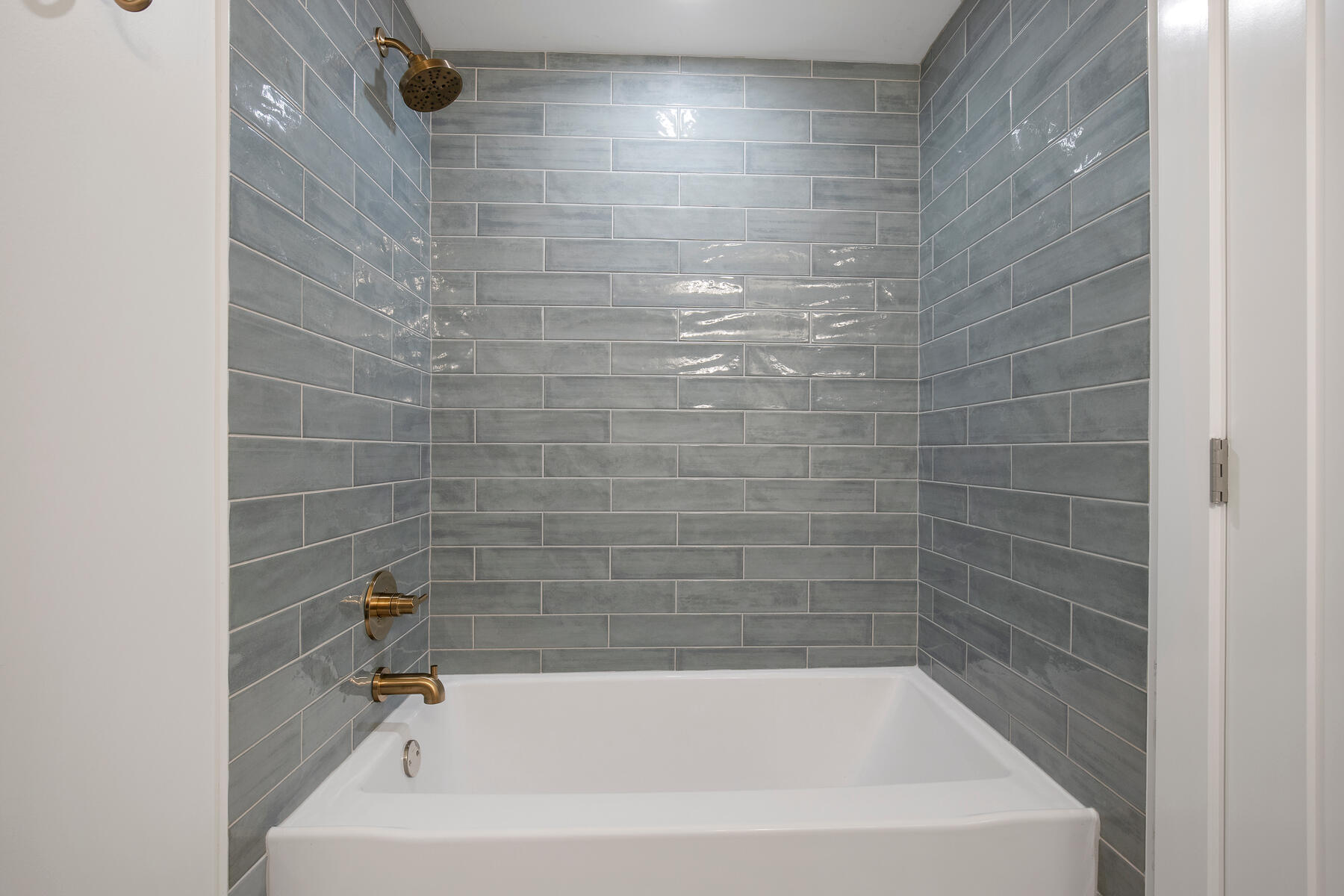 42 Sandy Valley Road Marstons Mills, MA 02648 - Photo 18 of 43 a close up of a bathtub in a bathroom