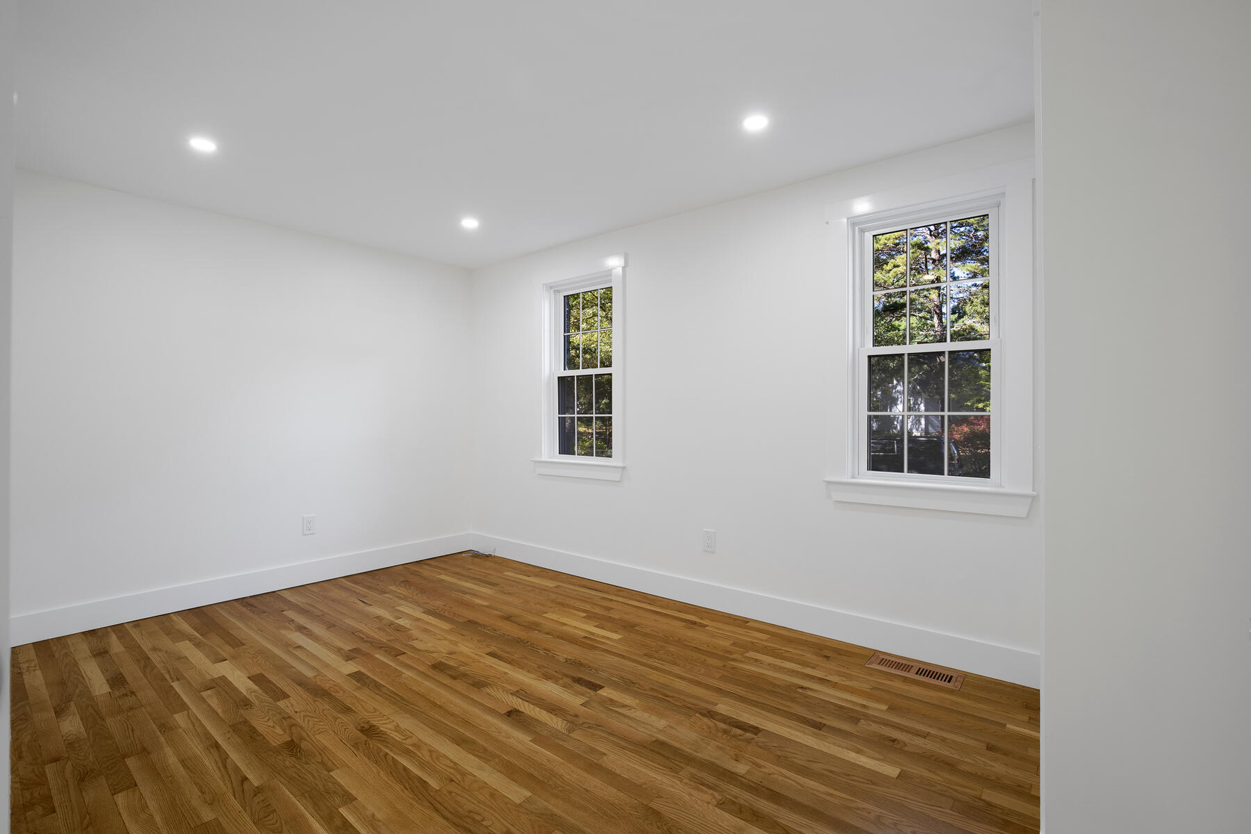42 Sandy Valley Road Marstons Mills, MA 02648 - Photo 19 of 43 a view of empty room with wooden floor and fan