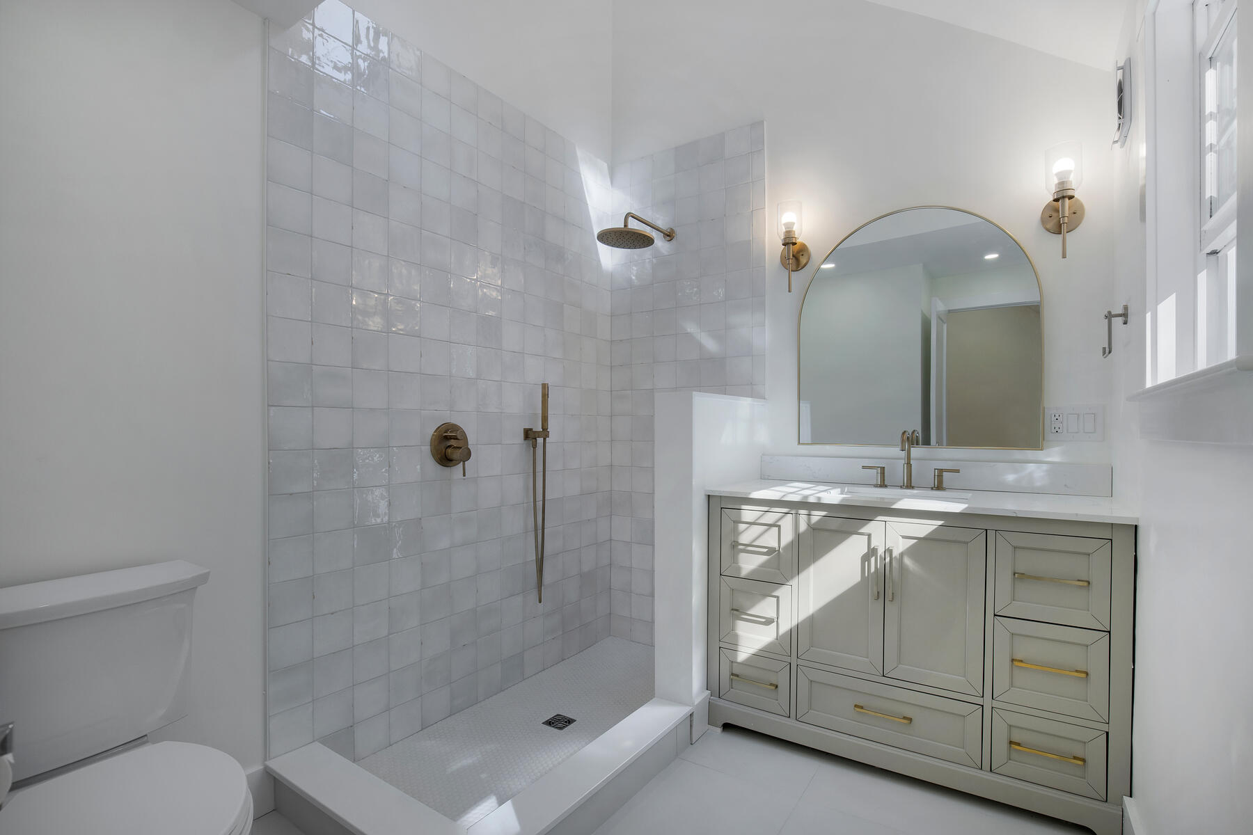 42 Sandy Valley Road Marstons Mills, MA 02648 - Photo 23 of 43 a bathroom with a sink a toilet and shower