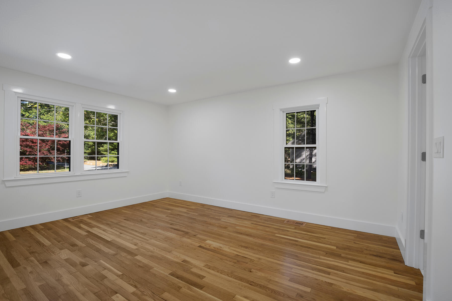 42 Sandy Valley Road Marstons Mills, MA 02648 - Photo 24 of 43 a view of empty room with wooden floor and fan