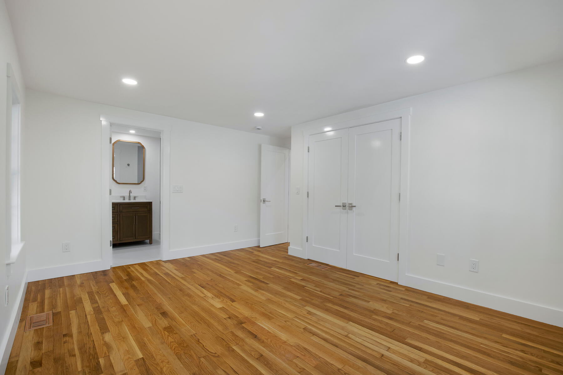 42 Sandy Valley Road Marstons Mills, MA 02648 - Photo 26 of 43 a view of a room with a bed and wooden floor