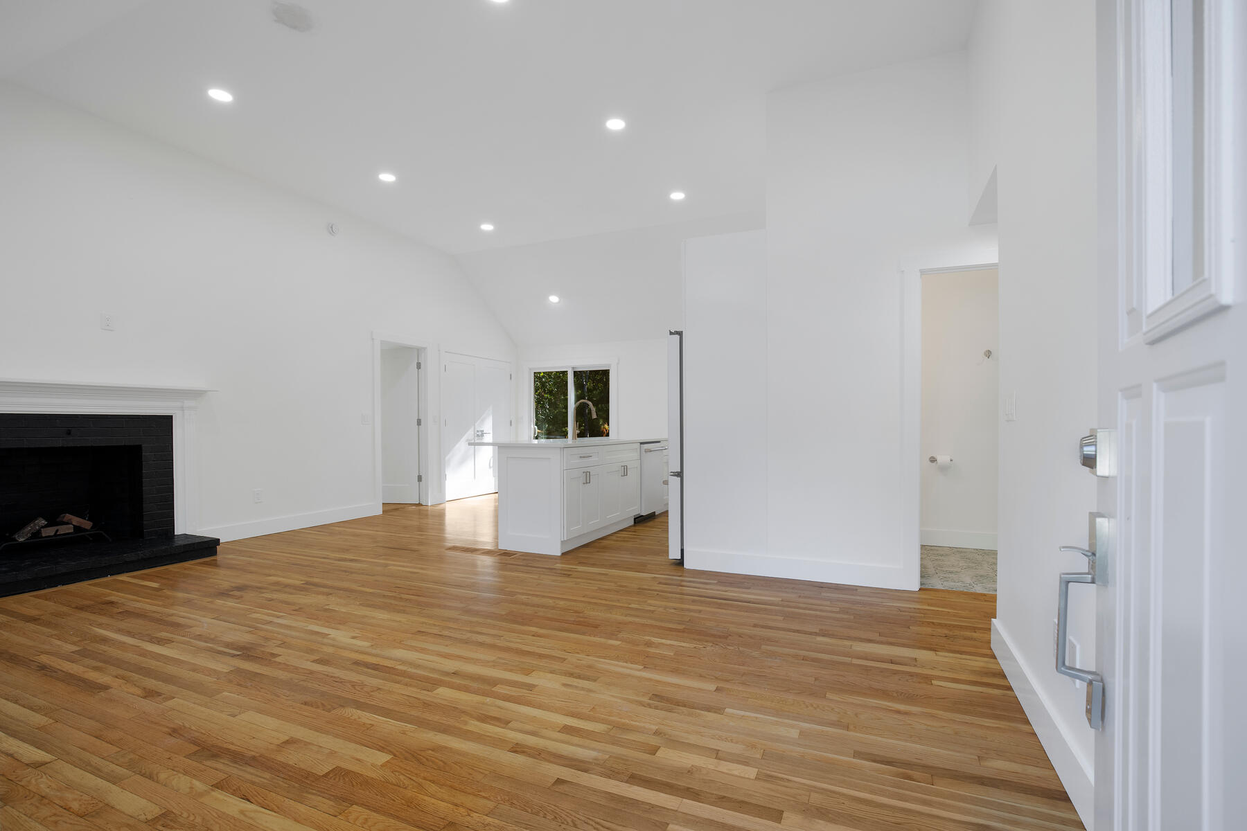 42 Sandy Valley Road Marstons Mills, MA 02648 - Photo 5 of 43 a view of empty room with wooden floor and fireplace