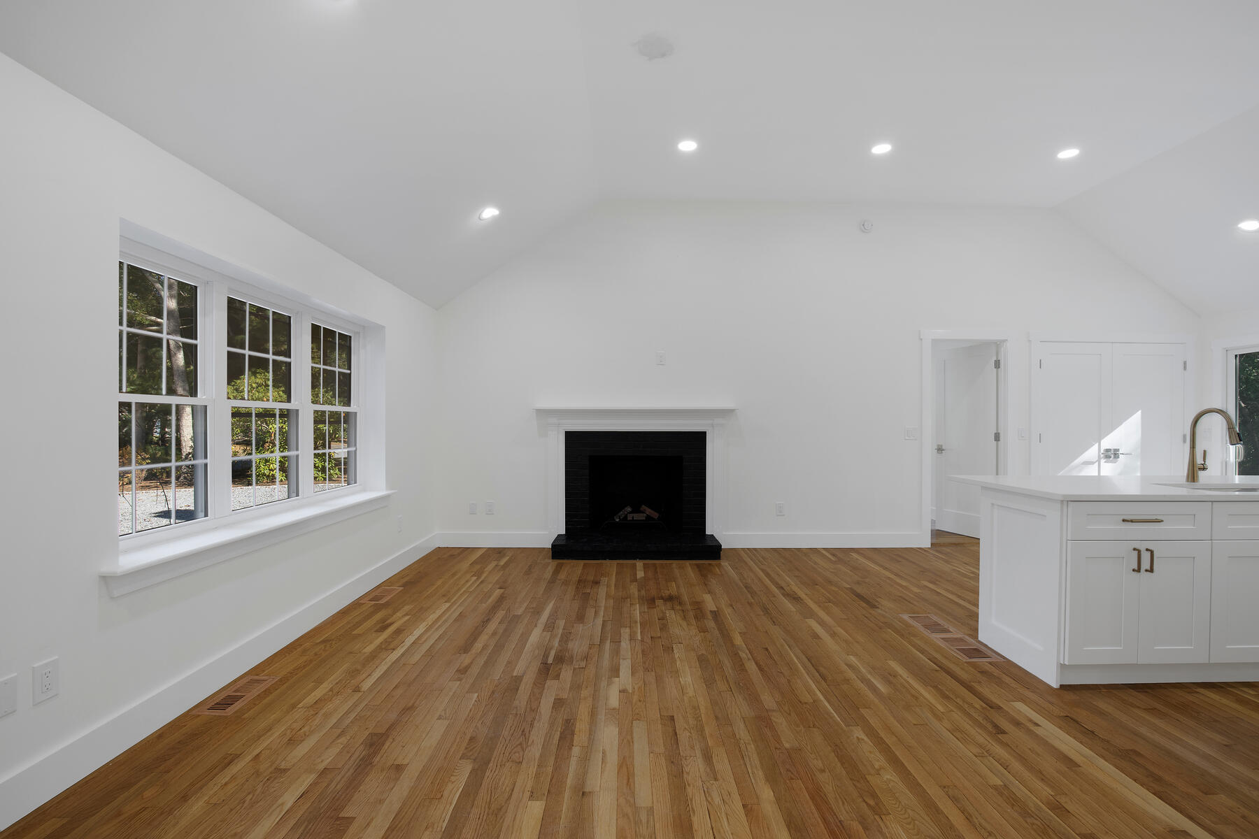 42 Sandy Valley Road Marstons Mills, MA 02648 - Photo 6 of 43 a view of a kitchen with wooden floor and a sink