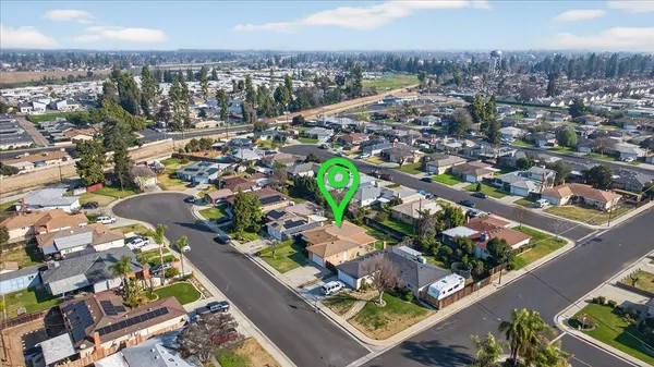 an aerial view of lake and city