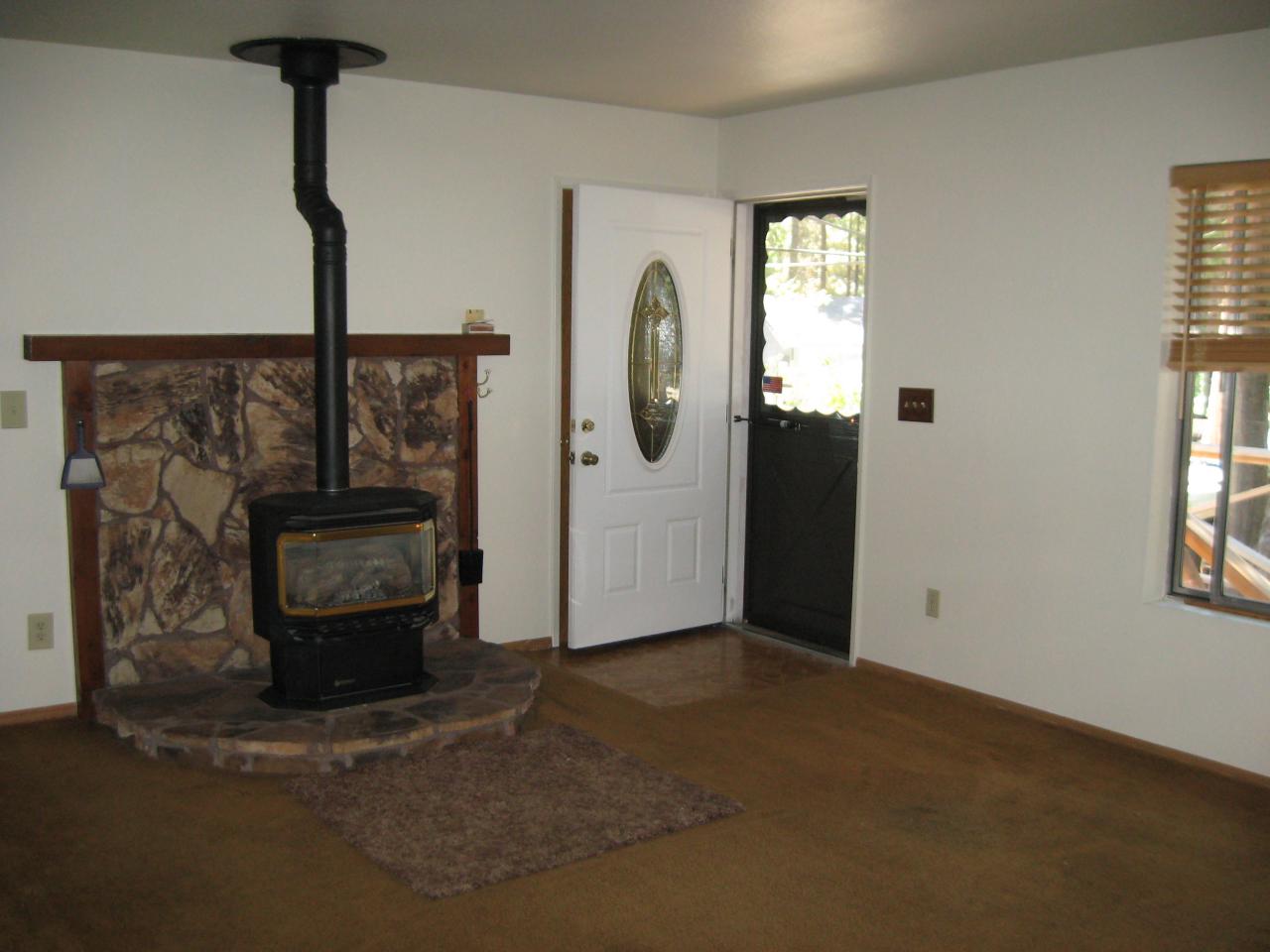 8470 Starlite Pines Road Shingletown, CA 96088 - Photo 4 of 9 ENTRY & GAS STOVE