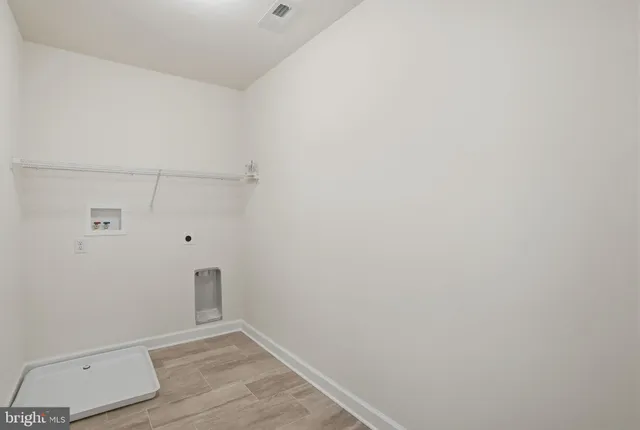 a view of small space with racks on the wall