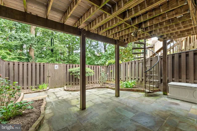 a garden view with a seating space