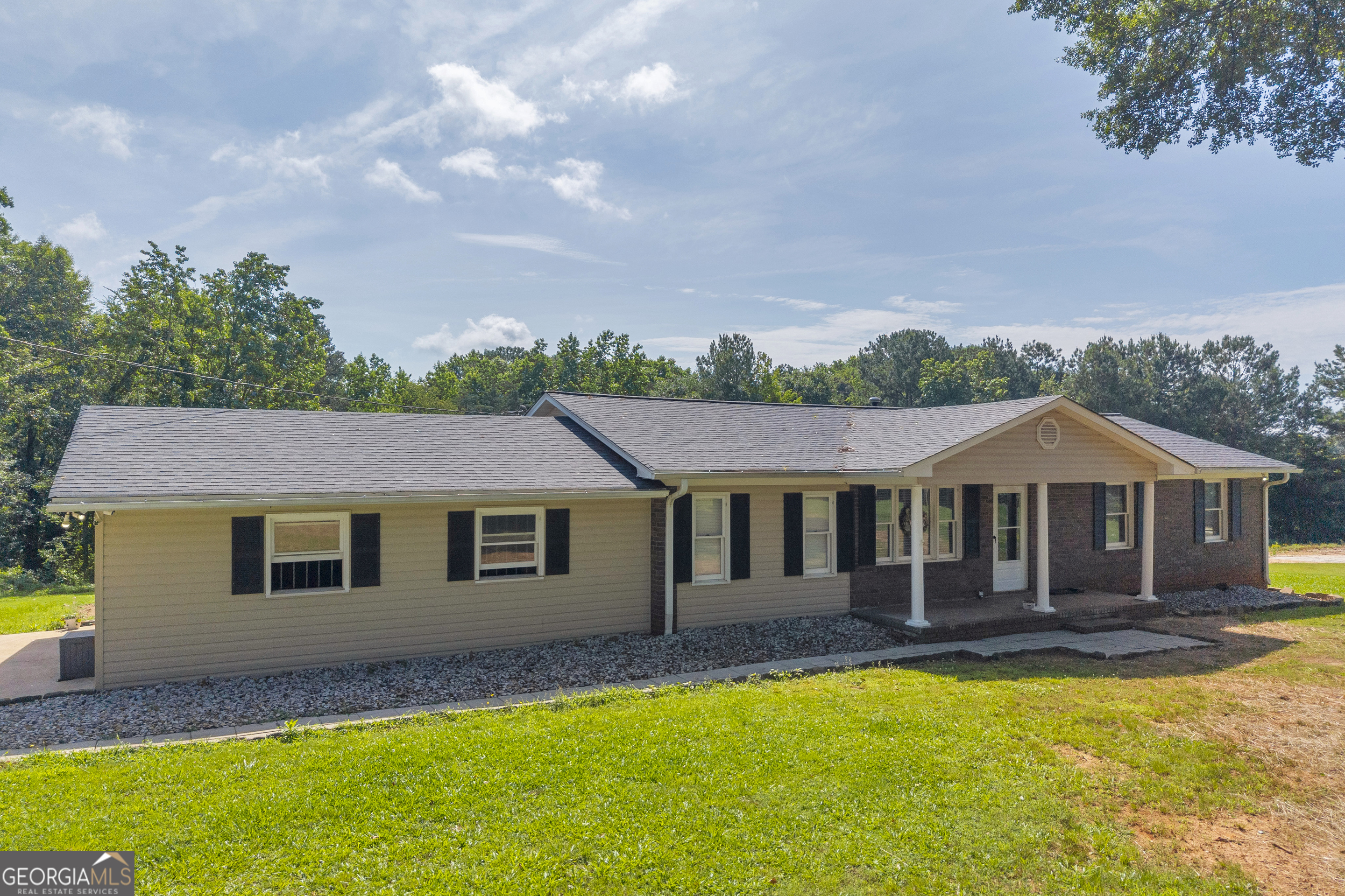 2000 Cawthon Davis Road Canon, GA 30520 - Photo 1 of 1 a front view of a house with a yard