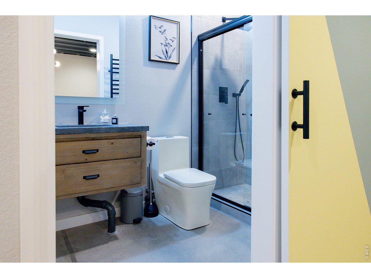 3044 Comet Street Fort Collins, CO 80524 - Photo 22 of 50 A beautifully customized bathroom adds a fresh, modern touch.