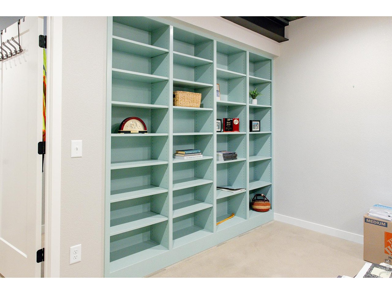 3044 Comet Street Fort Collins, CO 80524 - Photo 23 of 50 Built-in shelves offer stylish storage and display space for books, keepsakes, and all your favorite little treasures.