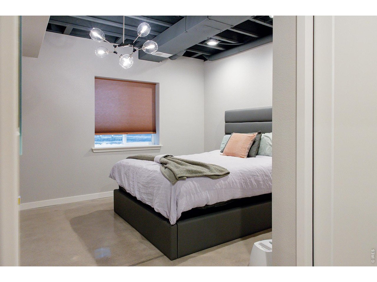 3044 Comet Street Fort Collins, CO 80524 - Photo 24 of 50 This spacious bedroom offers a quiet and comfortable lower-level retreat.