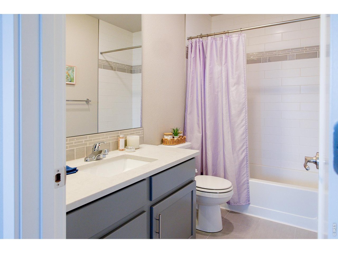 3044 Comet Street Fort Collins, CO 80524 - Photo 39 of 50 Thoughtfully designed for everyday convenience, the upper level features a full second bathroom with a tub and a nearby laundry room.