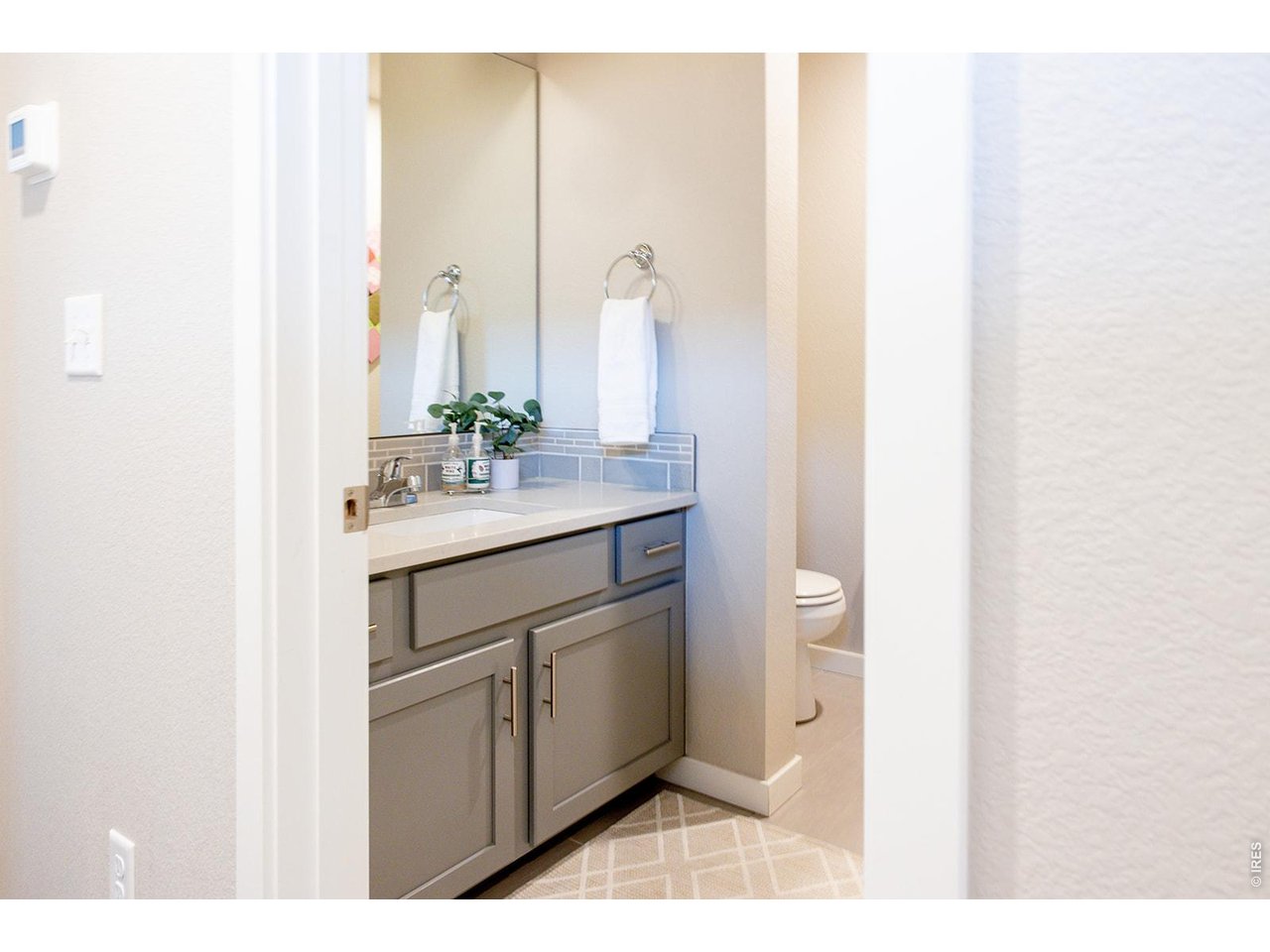 3044 Comet Street Fort Collins, CO 80524 - Photo 7 of 50 Conveniently located on the main level, the powder room adds an extra touch of ease to everyday living.