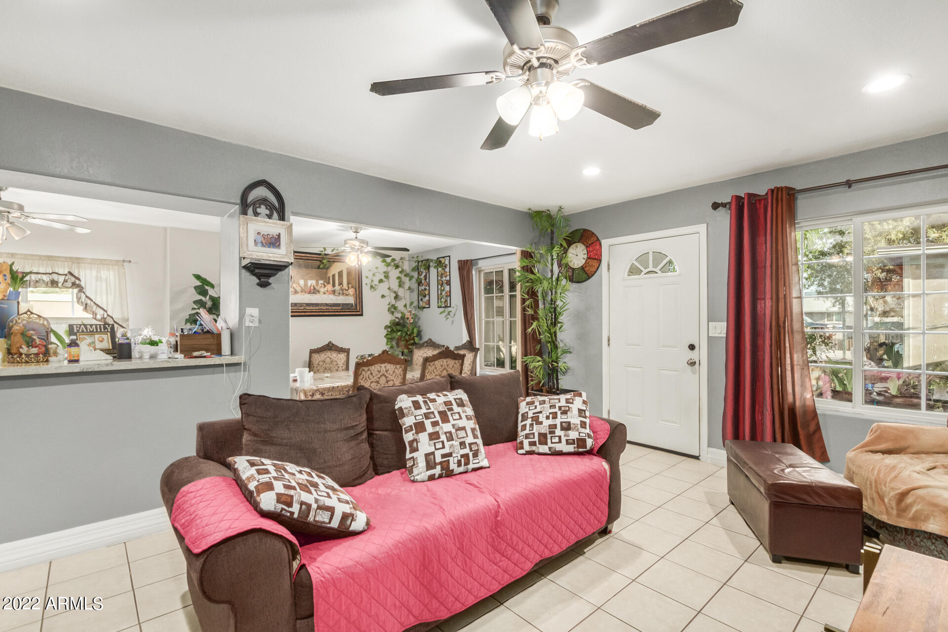 2726 West Taylor Street Phoenix, AZ 85009 - Photo 12 of 26 a living room with furniture and a large window