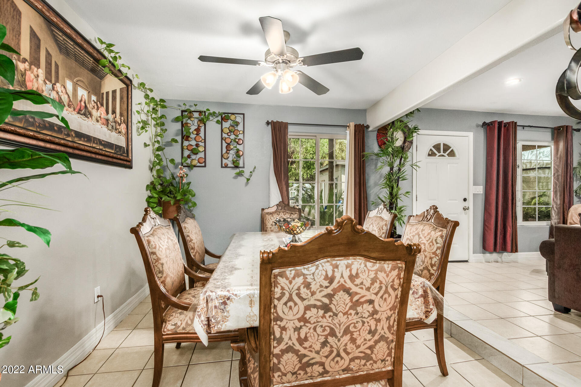 2726 West Taylor Street Phoenix, AZ 85009 - Photo 14 of 26 a view of a dining room with furniture and window