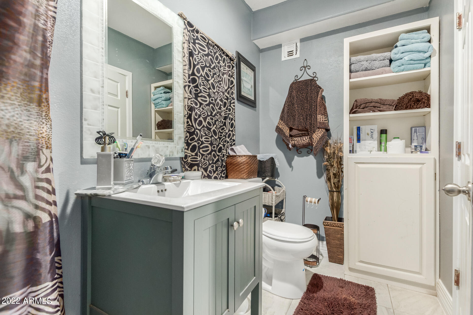2726 West Taylor Street Phoenix, AZ 85009 - Photo 22 of 26 a view of bathroom with a sink and toilet