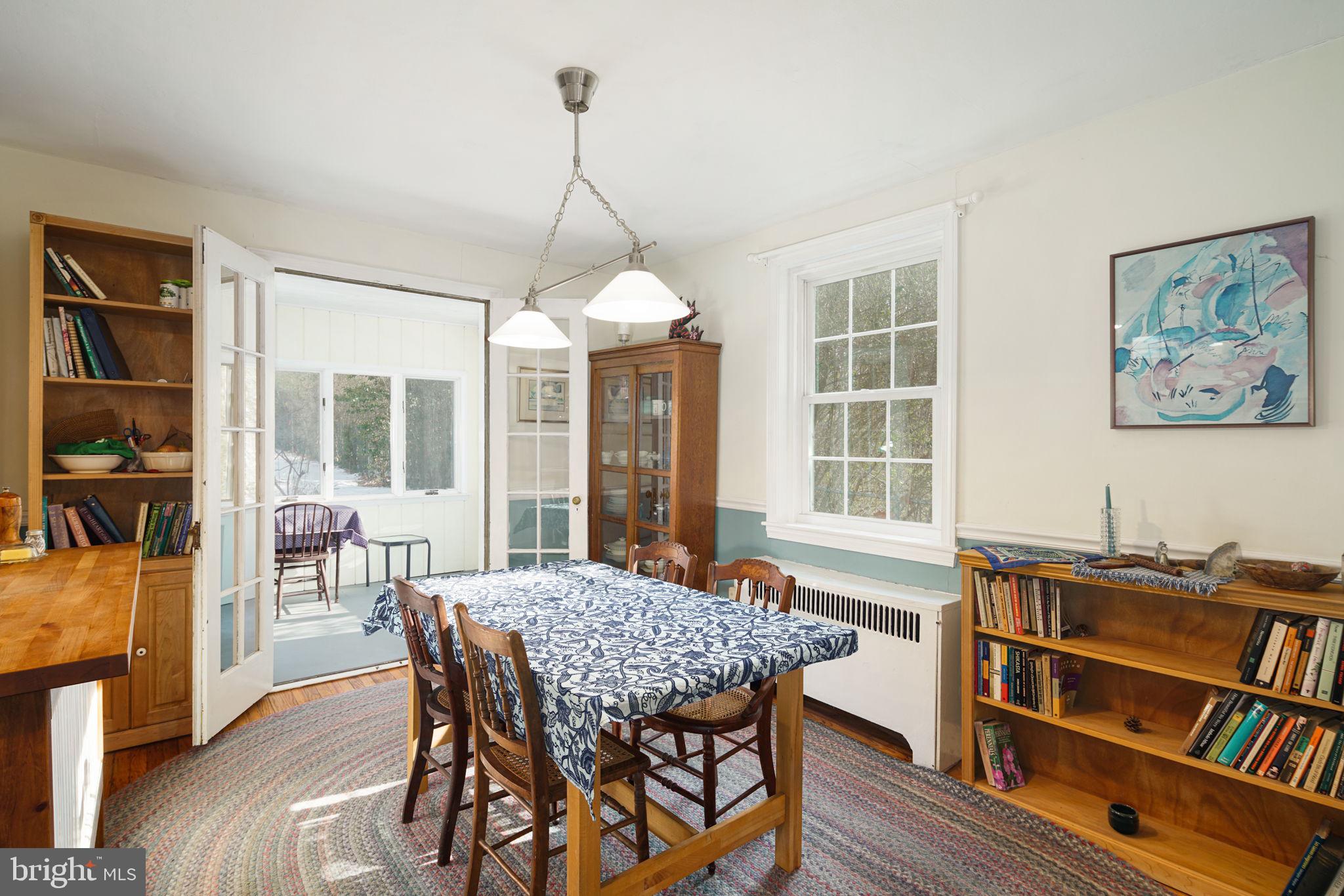 7019 Cresheim Road Philadelphia, PA 19119 - Photo 8 of 30 French doors open to sun porch
