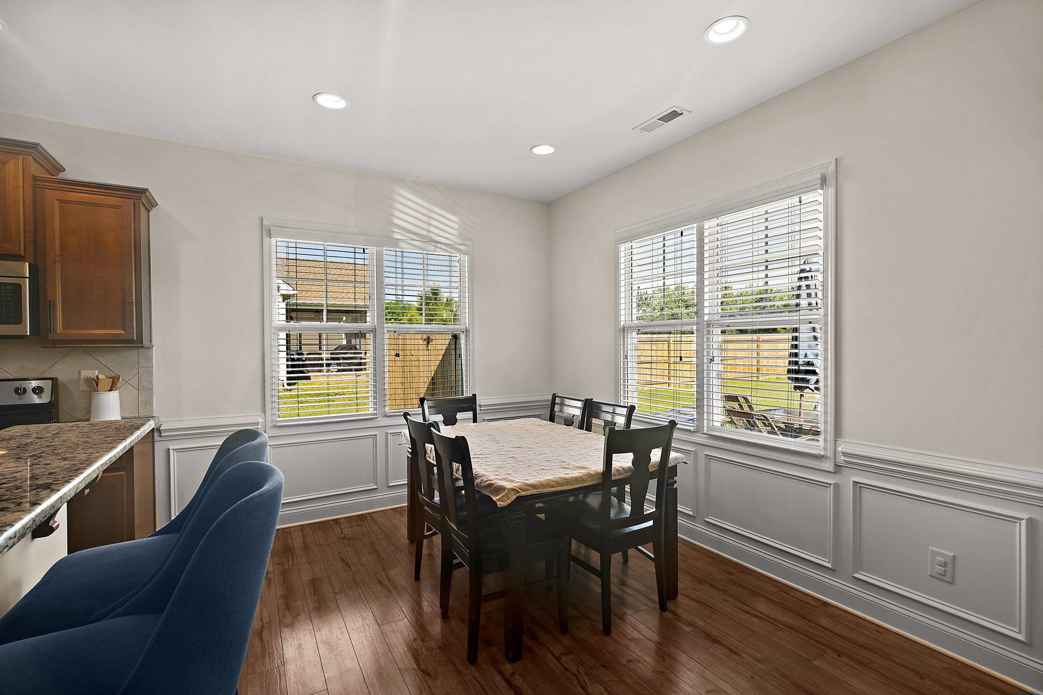 139 Torchie Drive Selma, NC 27576 - Photo 11 of 49 a view of a dining room with furniture window and wooden floor