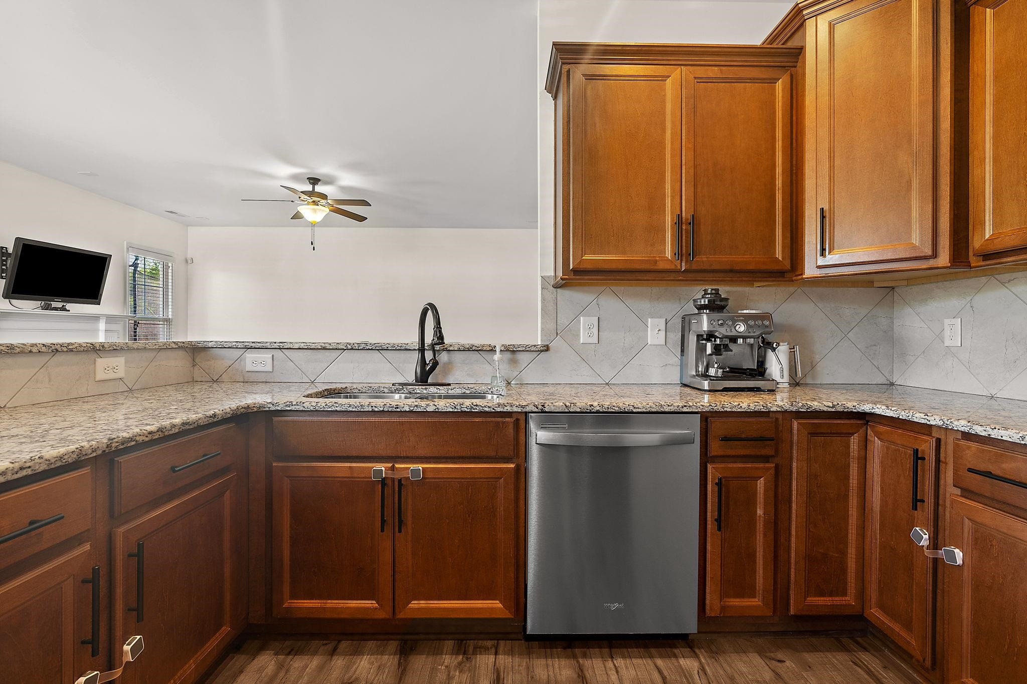 139 Torchie Drive Selma, NC 27576 - Photo 14 of 49 a kitchen with stainless steel appliances granite countertop a sink and cabinets