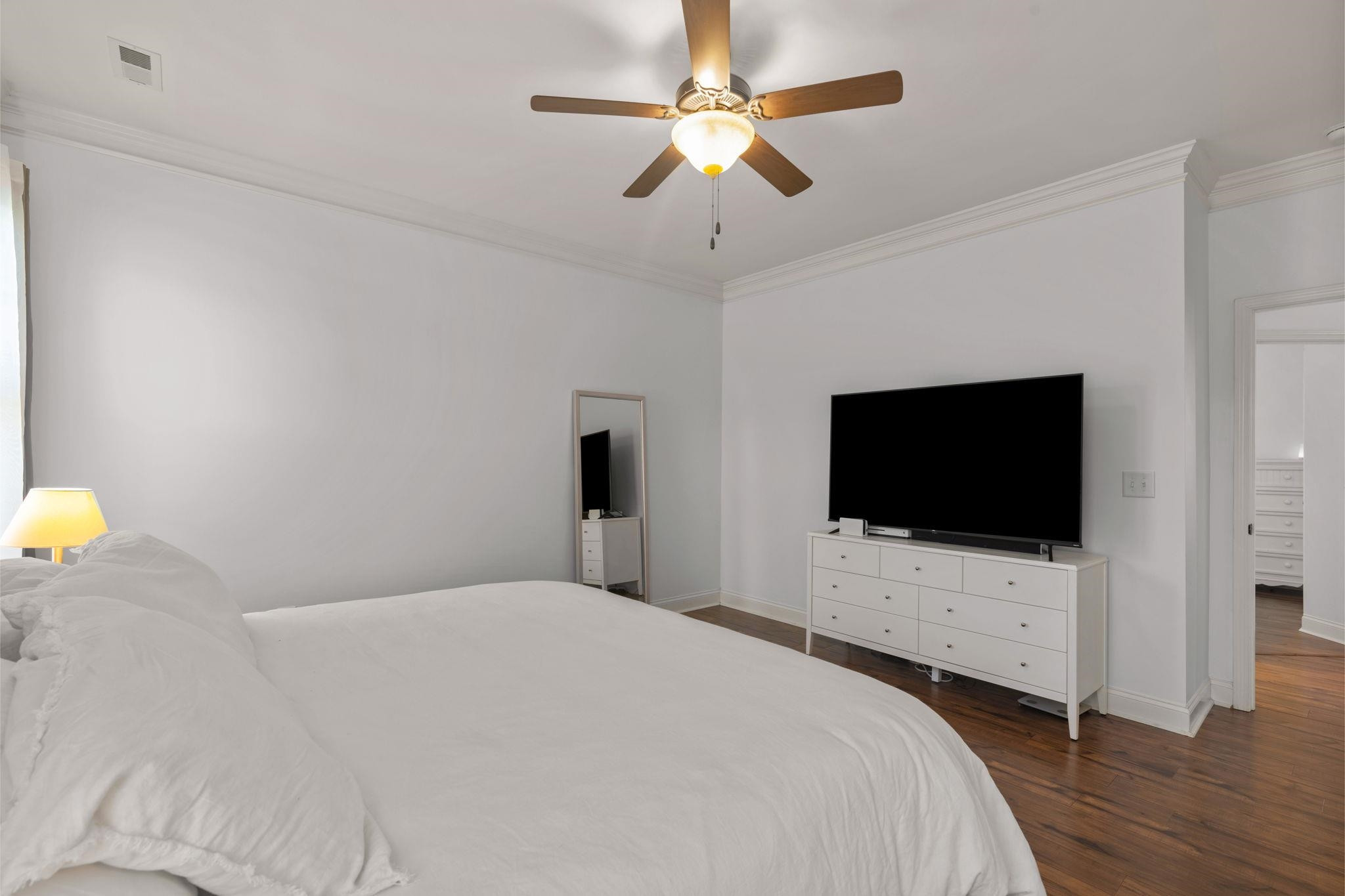 139 Torchie Drive Selma, NC 27576 - Photo 21 of 49 a bedroom with a bed and a flat screen tv