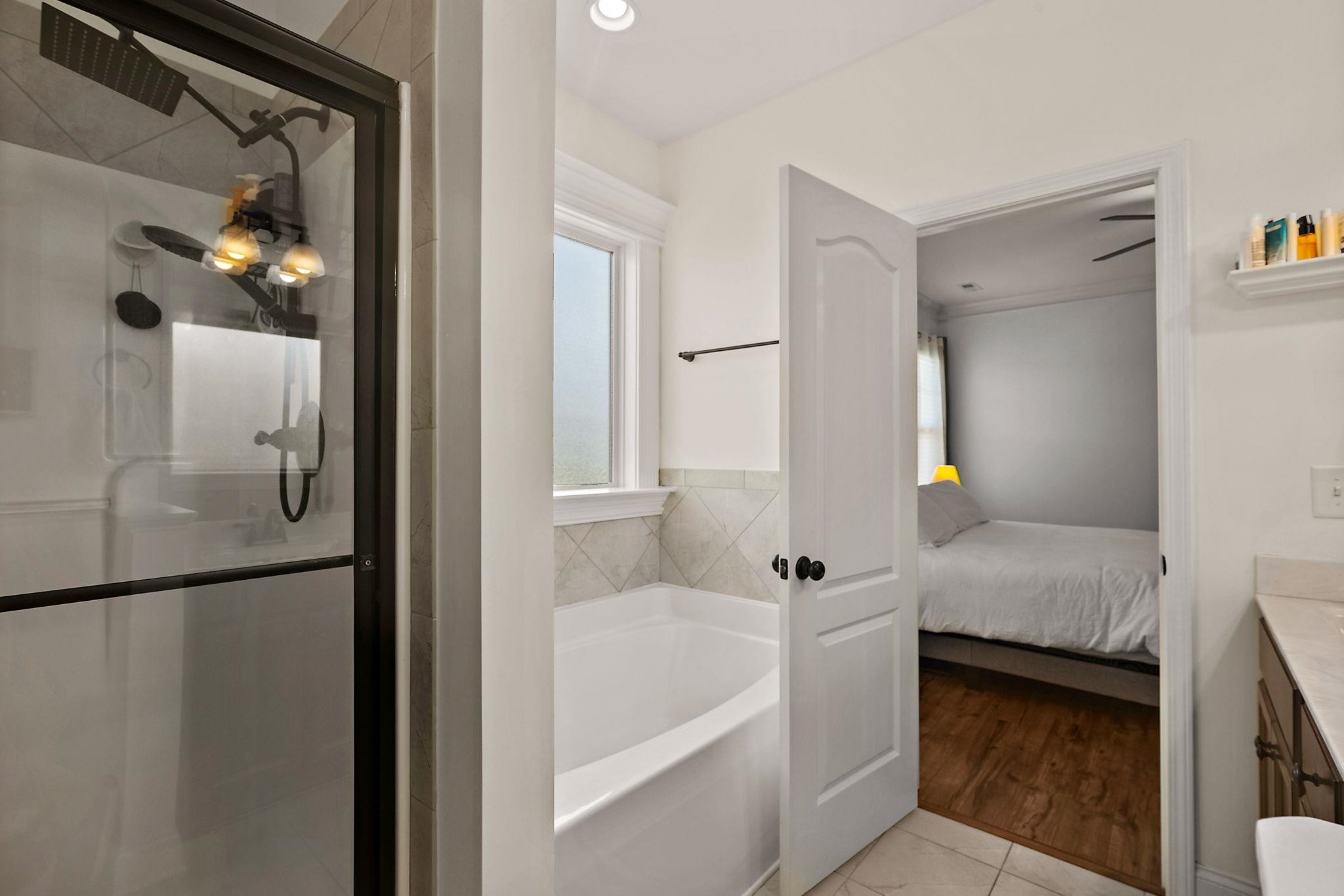 139 Torchie Drive Selma, NC 27576 - Photo 24 of 49 a bathroom with a tub and shower