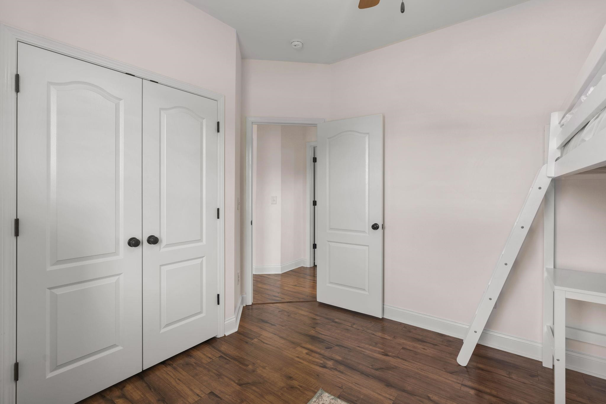 139 Torchie Drive Selma, NC 27576 - Photo 27 of 49 a view of a hallway with wooden floor