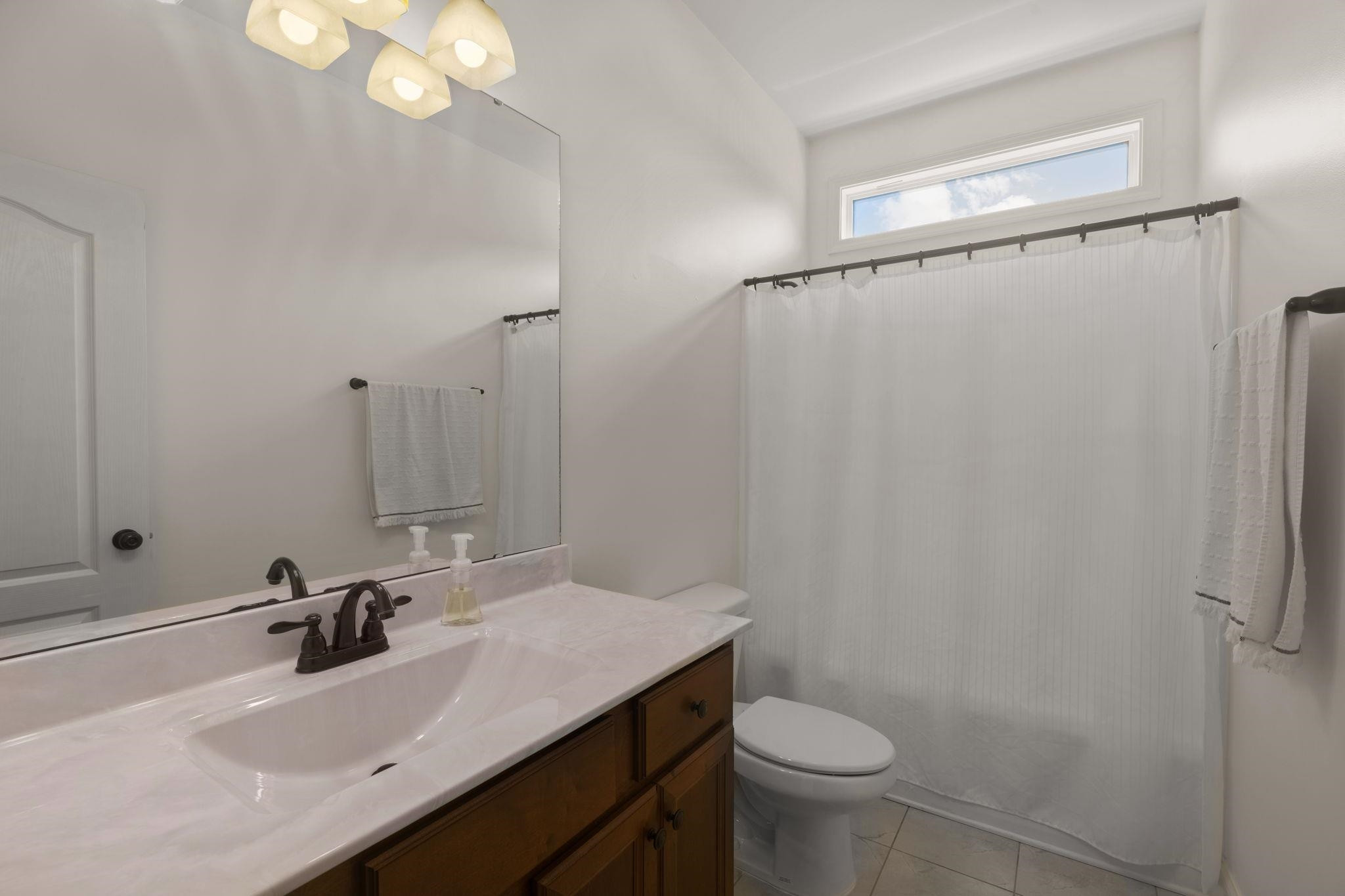139 Torchie Drive Selma, NC 27576 - Photo 28 of 49 a bathroom with a sink toilet and shower