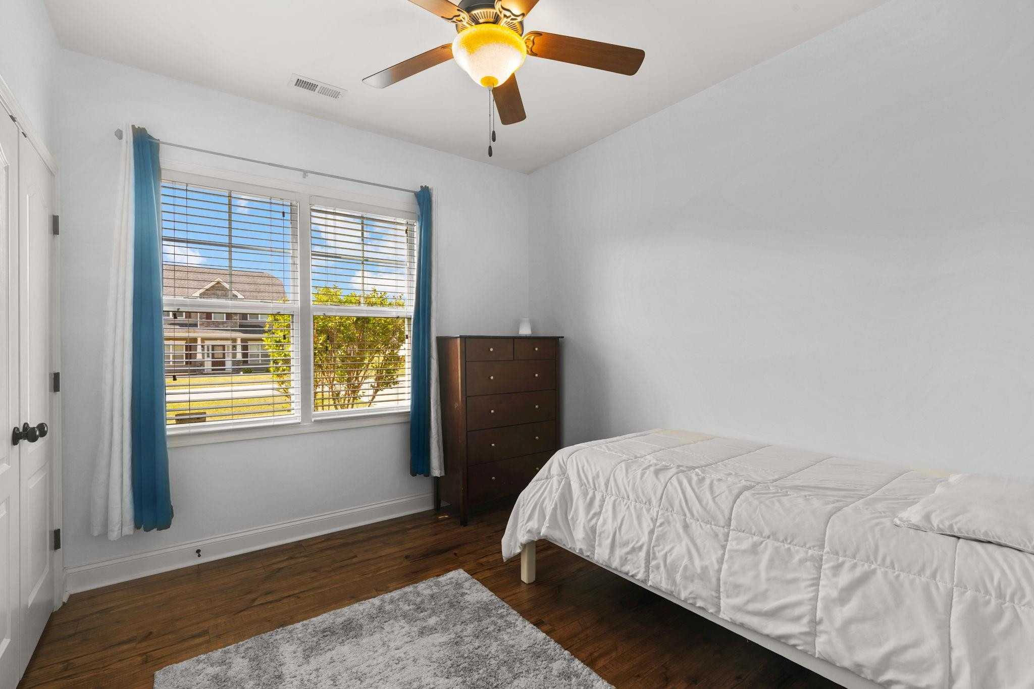 139 Torchie Drive Selma, NC 27576 - Photo 29 of 49 a bedroom with a bed and a window