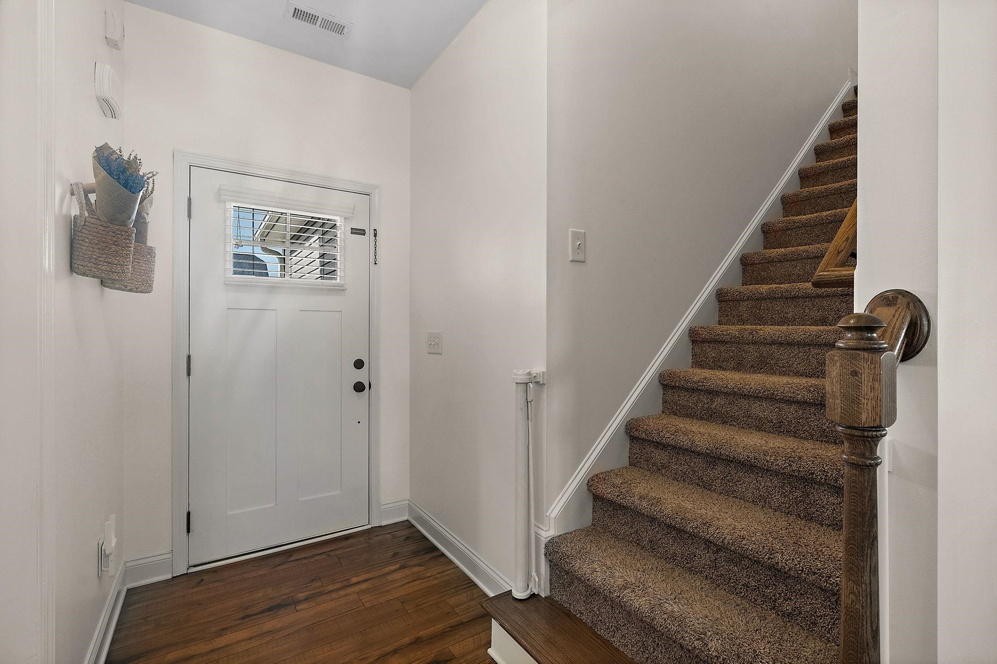 139 Torchie Drive Selma, NC 27576 - Photo 31 of 49 a view of entryway and gallery with wooden floor