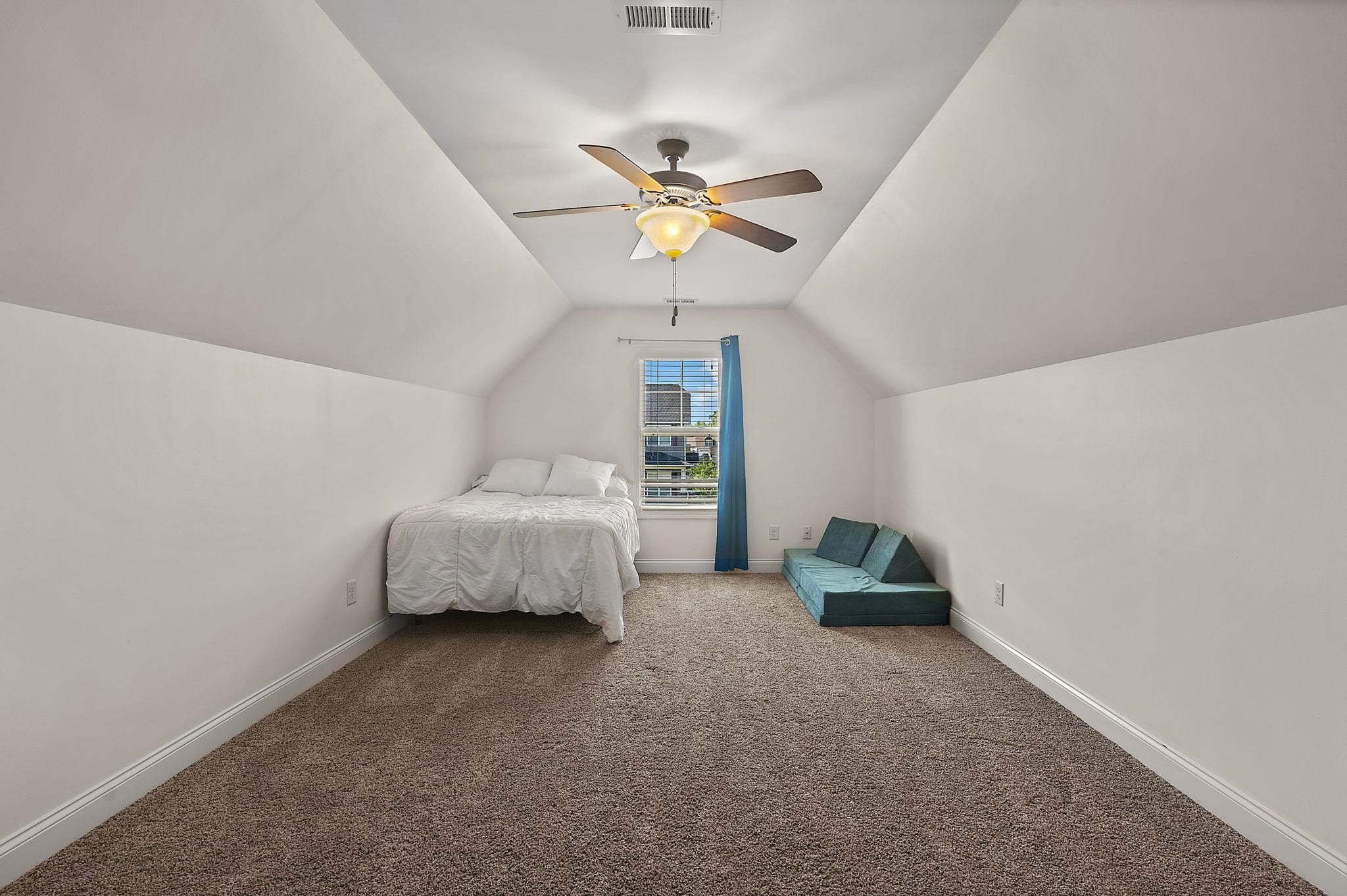 139 Torchie Drive Selma, NC 27576 - Photo 32 of 49 a living room with furniture and a chandelier