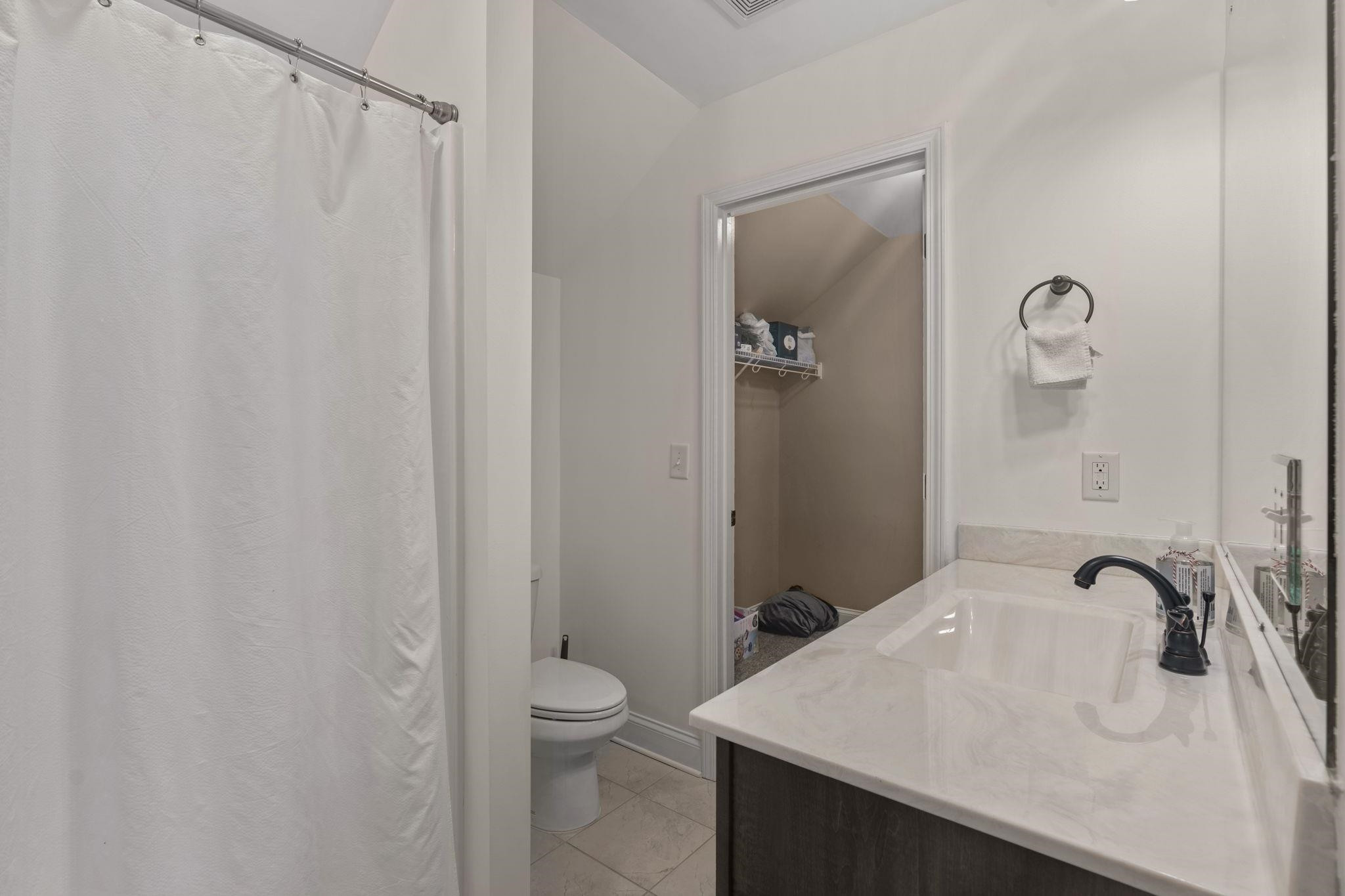 139 Torchie Drive Selma, NC 27576 - Photo 35 of 49 a bathroom with a sink a toilet and shower