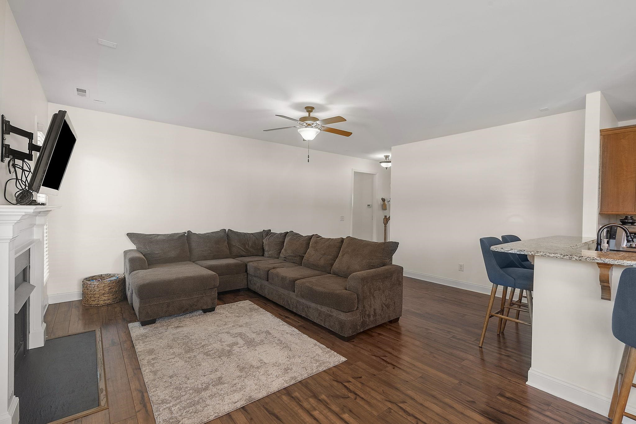 139 Torchie Drive Selma, NC 27576 - Photo 7 of 49 a living room with furniture and a flat screen tv