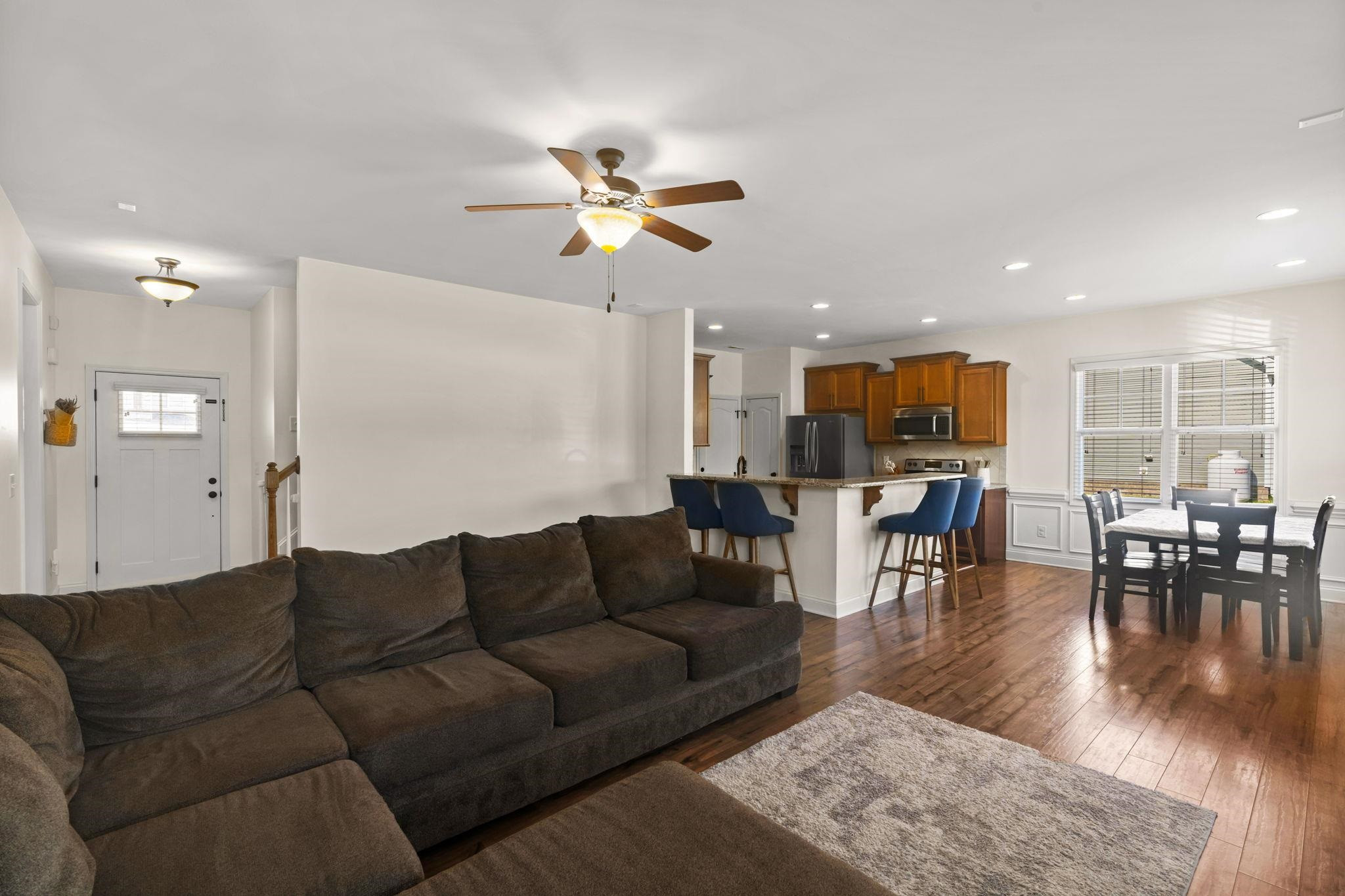 139 Torchie Drive Selma, NC 27576 - Photo 8 of 49 a living room with furniture kitchen view and a dining table
