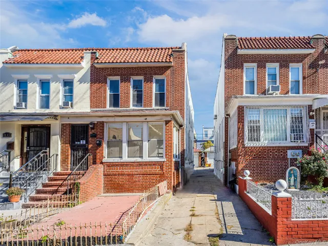 a view of a building with sitting area