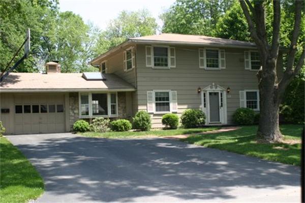 12 Winifred Road Framingham, MA 01701 - Photo 1 of 1 a front view of a house with a garden