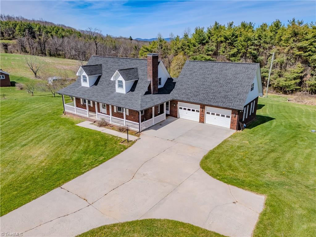 11325 Glade Valley Road Ennice, NC 28623 - Photo 1 of 43