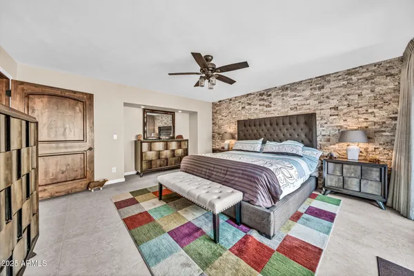 a view of a kitchen with stainless steel appliances granite countertop a sink and counter space